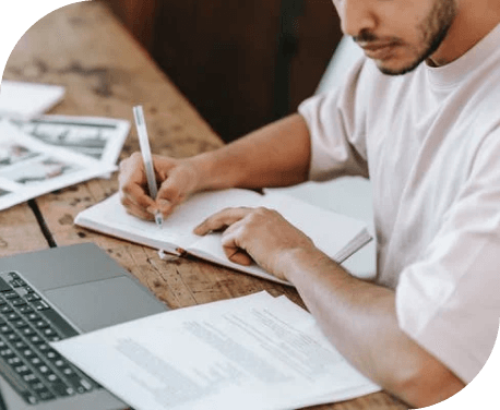 student boy on notebook